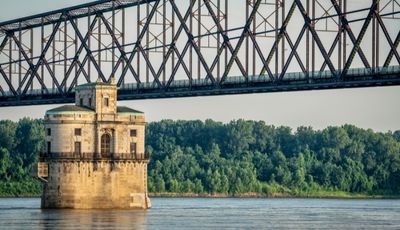Old Chain of Rocks Bridge and water tower on Mississippi River